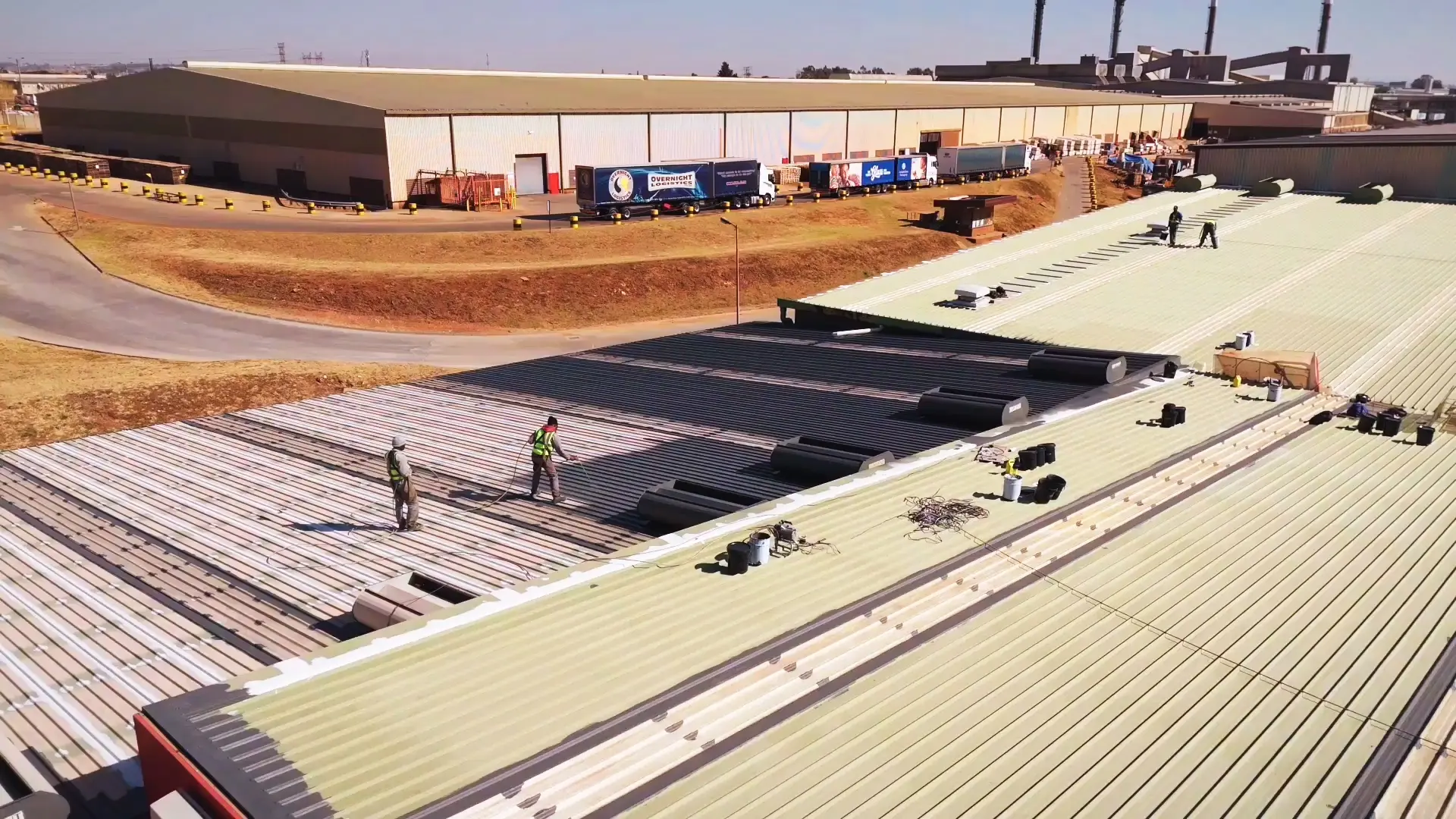 Commercial roof coatings application on industrial building in Gauteng